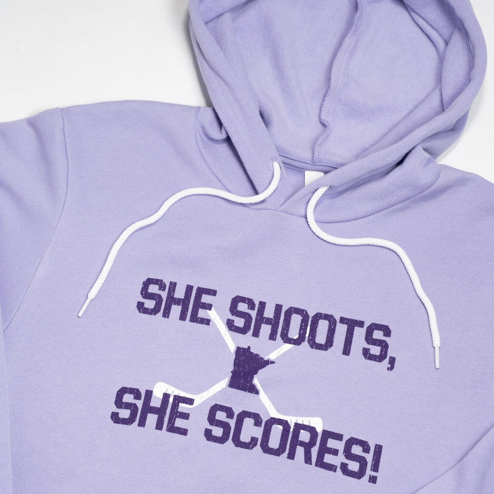 She Shoots, She Scores - Minnesota Hockey Hoodie - Northmade Co