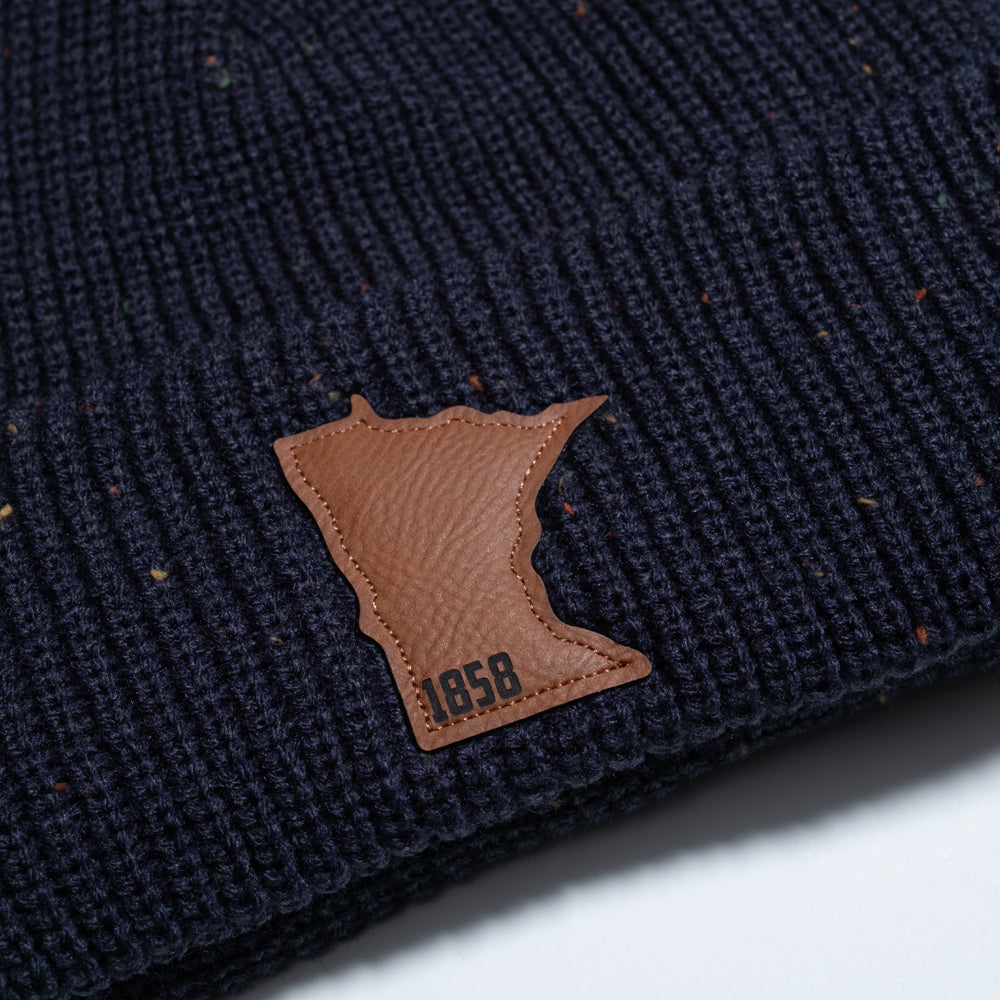 Minnesota 1858 Confetti Fleece Lined Knit Hat With Faux Fur Pom - Navy