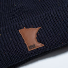 Minnesota 1858 Confetti Fleece Lined Knit Hat With Faux Fur Pom - Navy