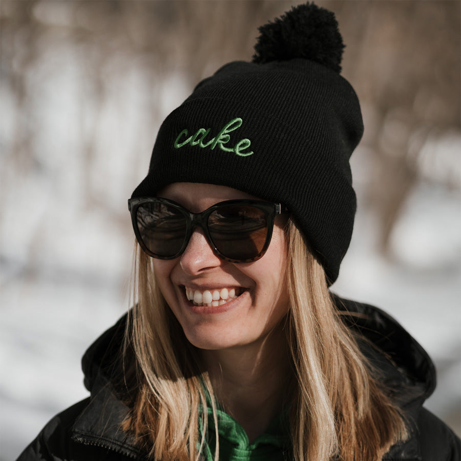 
                  
                    Cake Script Knit Winter Hat | Edina Pom Hat - Northmade Co
                  
                